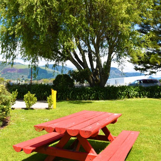 Picnic table by van parks and camping sites